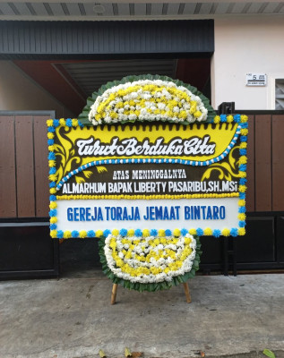 Papan Bunga Duka di Pabaton